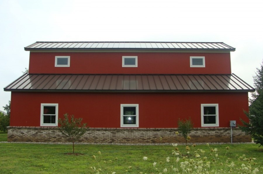 Modern galvanized steel barndominiums in Safford, Arizona showcasing sustainability and rustic charm