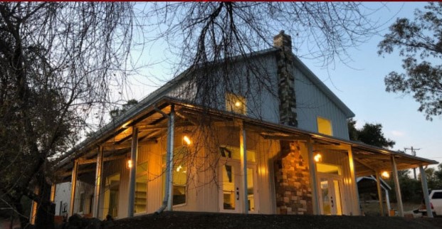 Stunning galvanized steel barndominiums in Sun Lakes, Arizona showcasing modern design and rustic charm